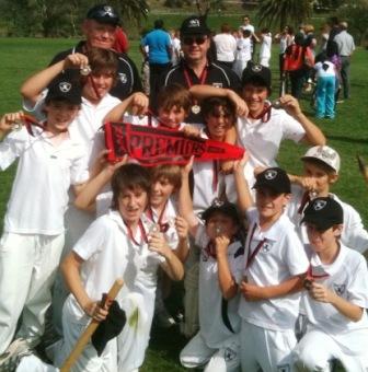 The winning team with coaches Darren Nagle (left) and Ross Aitken.